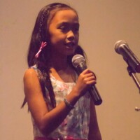 female kid singing lesson