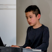 piano played by a kid