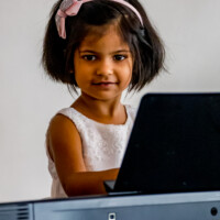 girl playing piano
