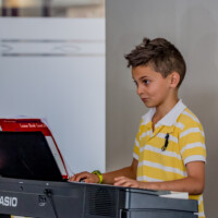 male kid piano recital