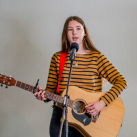 guitar teacher playing