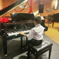 male kid singing lesson