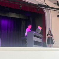 boy having piano recital